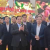 Prime Minister Pham Minh Chinh (second, left) and Deputy Prime Minister Bui Thanh Son (first, left) at the rehearsal on February 1 afternoon. (Photo: VNA)