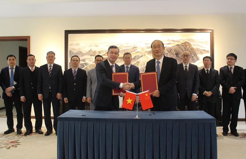 The signing ceremony of the fourth MoU between the State Audit Office of Vietnam and the National Audit Office of China in Beijing on March 17. (Photo: VNA)