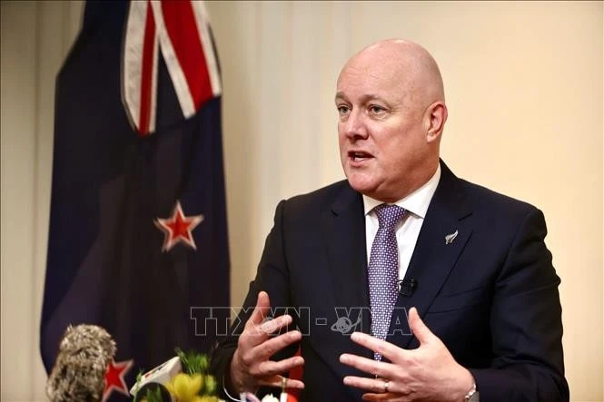 New Zealand Prime Minister Christopher Luxon speaks to the press. (Photo: VNA)