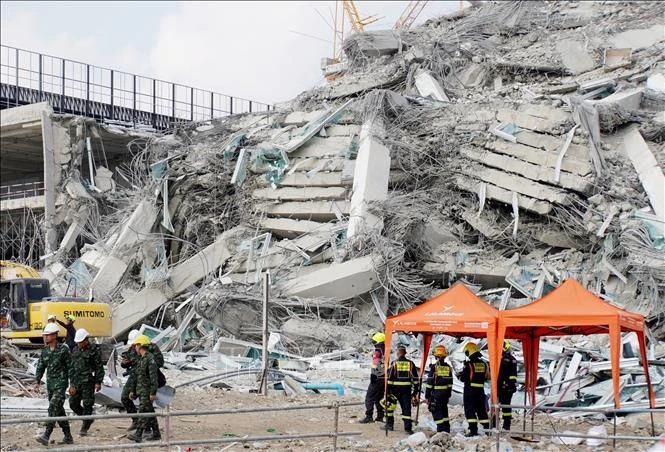The scene of the collapsed building in Bangkok, Thailand, caused by the earthquake in Myanmar. (Photo: Kyodo/VNA)