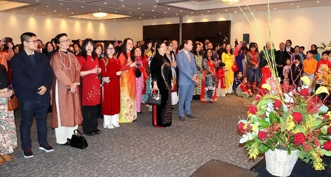 Participants at the homeland spring programme held in Brussels, on January 19 by the Vietnamese Embassy in Belgium, which is also in charge of Luxembourg. (Photo: VNA)