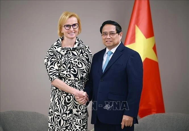 Prime Minister Pham Minh Chinh (R) and Chairwoman of the Communist Party of Bohemia and Moravia (KSCM) Katerina Konecna at their meeting in Prague on January 18. (Photo: VNA)