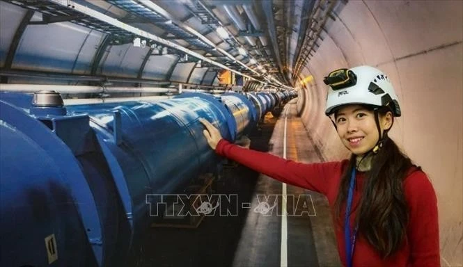 Physicist Pham Le Thu Ha, or Joni Pham, at the ATLAS system in the European Organisation for Nuclear Research (CERN). (Photo: VNA)