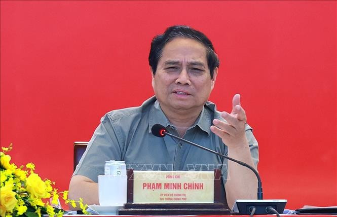 Prime Minister Pham Minh Chinh speaks at the working session. (Photo: VNA)