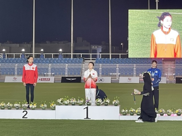 Mai Ngoc Anh (left) on the podium of the Asian U18 Athletics Championships' high jump event in Qatif, Saudi Arabia. (Photo: Vietnam Sports Team) 
