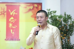 Defence Attaché of Vietnam to Laos Colonel Phan Huu Thang speaks at the event (Photo: VNA)