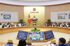 Prime Minister Pham Minh Chinh speaks at the regular Government meeting (Photo: VNA)