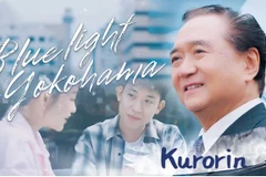 Kanagawa Governor Kuroiwa Yuji sings in Vietnamese language in the “Blue Light Yokohama” music video. (Photo: BETORAKU)