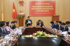 Vice Chairman of the National Assembly Nguyen Khac Dinh speaks at the meeting (Photo: VNA)