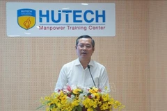 Deputy Minister of Education and Training Nguyen Van Phuc speaks at a conference in HCM City on December 26 to review the implementation of national strategies on semiconductor workforce development (Photo: VNA)