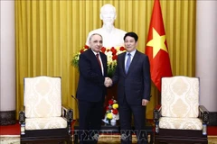 State President Luong Cuong (R) receives Prosecutor General of Azerbaijan Kamran Bayram Aliyev (Photo: VNA)