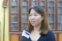 Nguyen Thi Thu Huyen, Chief of the Office of the Association of Vietnamese People in Vientiane, grants an interview to the Vietnam News Agency (Photo: VNA)