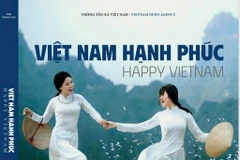 Cover page of Viet Nam hanh phuc (Happy Vietnam) book (Photo: VNA)