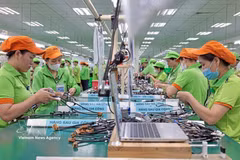 An assembly line for post-processing products at the factory of Bandai Vietnam Co., Ltd. (Photo: VNA) 