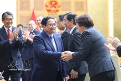 Prime Minister Pham Minh Chinh meets with leaders of Japanese businesses. (Photo: VNA)
