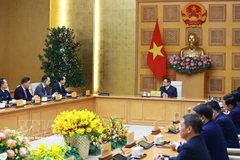 Prime Minister Pham Minh Chinh receives Chinese Ambassador to Vietnam He Wei (Photo: VNA)