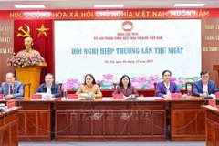 The Presidium of the Vietnam Fatherland Front (VFF) Central Committee chairs the first consultation on December 4. (Photo: VNA)