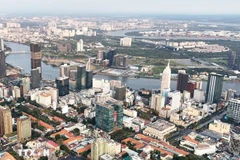 Ho Chi Minh City’s downtown area and the Thu Thiem Peninsula, where the International Financial Centre is being developed in Ho Chi Minh City. (Photo: VNA) 