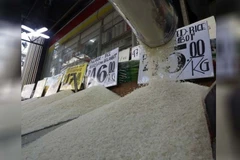Rice dealers display rice and their prices at Trabajo Market in Sampaloc, Manila. (Photo: philstar.com)