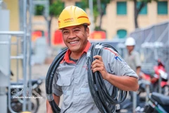 The joy of Bui Duc Nam, a technician at the Viettel construction branch in Hanoi under the Viettel Construction Joint Stock Corporation (Photo: VNA) 