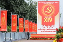 Banners and slogans line the streets of Hanoi in celebration of the 14th National Congress of the Communist Party of Vietnam. (Photo: VNA)