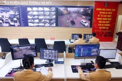 Police officers at the Hanoi traffic control centre (Photo: VNA)