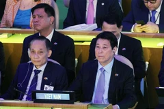 State President Luong Cuong (R) and Acting Minister of Foreign Affairs Le Hoai Trung attend the high-level meeting commemorating the 80th anniversary of the founding of the United Nations. (Photo: VNA) 