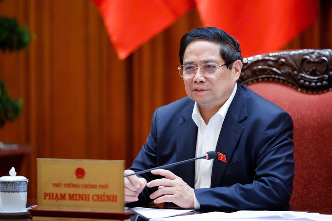 PM Pham Minh Chinh presides over the meeting of permanent Government members in Hanoi on May 24. (Photo: VNA) vna-potal-thu-tuong-chu-tri-hop-chuan-bi-dam-phan-thuong-mai-voi-hoa-ky-ngay-245-8051726.jpg