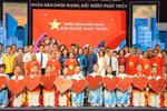 Vice Chairwoman of the National Assembly Nguyen Thi Thanh, Minister of Health Dao Hong Lan, and delegates attend the programme. (Photo: nhandan.vn)
