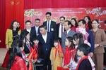 Politburo member and standing member of the Party Central Committee’s Secretariat Tran Cam Tu extends his regards to children currently receiving care at Social Protection Centre No. 1 in Lao Cai province. (Photo: VNA)