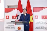 Chairman of the National Assembly Tran Thanh Man addresses a seminar on the development and operation of international financial centres in Switzerland, on July 28, 2025. (Photo: VNA)