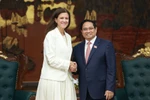 Prime Minister Pham Minh Chinh meets with María Victoria “Marí” Zíngoni, Chief Executive Officer for Power at US-based GE Vernova, in Hanoi on September 30. (Photo: VNA)