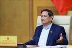Prime Minister Pham Minh Chinh chairs a meeting with ministry and sector leaders on preparations for the exhibition, to be held in celebration of the 80th anniversary of the National Day (September 2, 1945 –2025). (Photo: VNA)