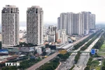 Apartment buildings along Metro Line 1 and Vo Nguyen Giap Boulevard, Thu Duc city. (Photo: VNA)