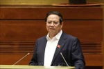 Prime Minister Pham Minh Chinh delivers a speech at the national conference to disseminate and implement the Politburo's Resolutions No. 66-NQ/TW and No. 68-NQ/TW. (Photo: VNA)