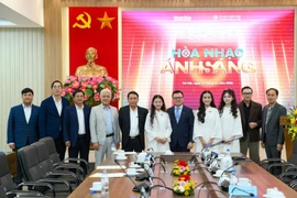 Representatives of the organising board, officials and artists at the programme announcement event. (Photo: VNA)