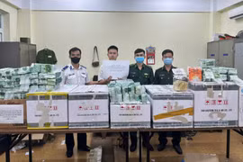 The ring leader's Ly Thanh Huu (second from left) (Photo: VNA)