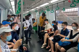 Passengers travel on the Cat Linh – Ha Dong urban railway line in Hanoi. (Photo: VNA)