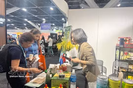 International customers are impressed by Vietnamese products for natural flavours and attractive packaging. (Photo: VNA) 