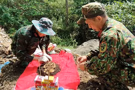 Efforts are stepped up to search for and recover remains of fallen soldiers at the Vi Xuyen battlefield. (Photo: qdnd.vn)