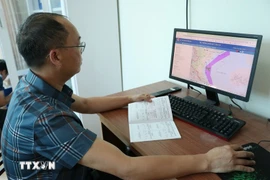 Inspecting fishing vessel data on the vessel monitoring system. (Photo: VNA) 