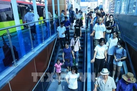 Passengers at a station of the Nhon - Hanoi Station metro line (Photo: VNA)