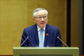 Permanent Deputy Prime Minister Nguyen Hoa Binh reports on the Government's performance during 2021–2026 at the 10th session of the 15th National Assembly on October 20, 2025. (Photo: VNA)