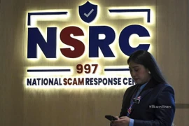 Malaysia's National Scam Response Centre (NSRC) at Menara 2 MCMC, Cyberjaya. (Photo: Straits Times)