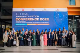 Delegates pose for a photo at the Global Higher Education Conference 2026 at Văn Lang University in HCM City on July 30. (Photos Courtesy of VLU)