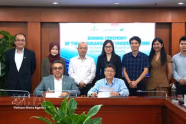 Delegates at the signing ceremony (Photo: VNA) 