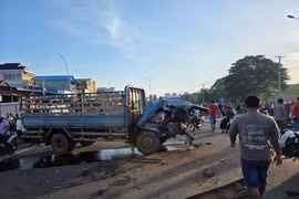 The aftermath of one of two traffic accidents that left at least 13 factory workers dead (Photo: phnompenhpost) 