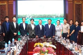 Officials of Tay Ninh province and the Japanese delegation pose for a photo at the meeting on November 26. (Photo: VNA) 