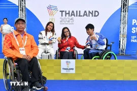 Vietnamese swimmer Vi Thi Hang secures her fourth gold medal at the 13th ASEAN Para Games. (Photo: VNA)
