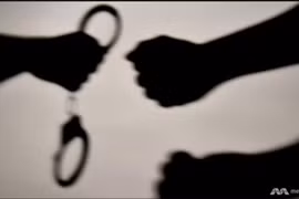 Photo illustration of handcuffs. (Photo: CNA) 